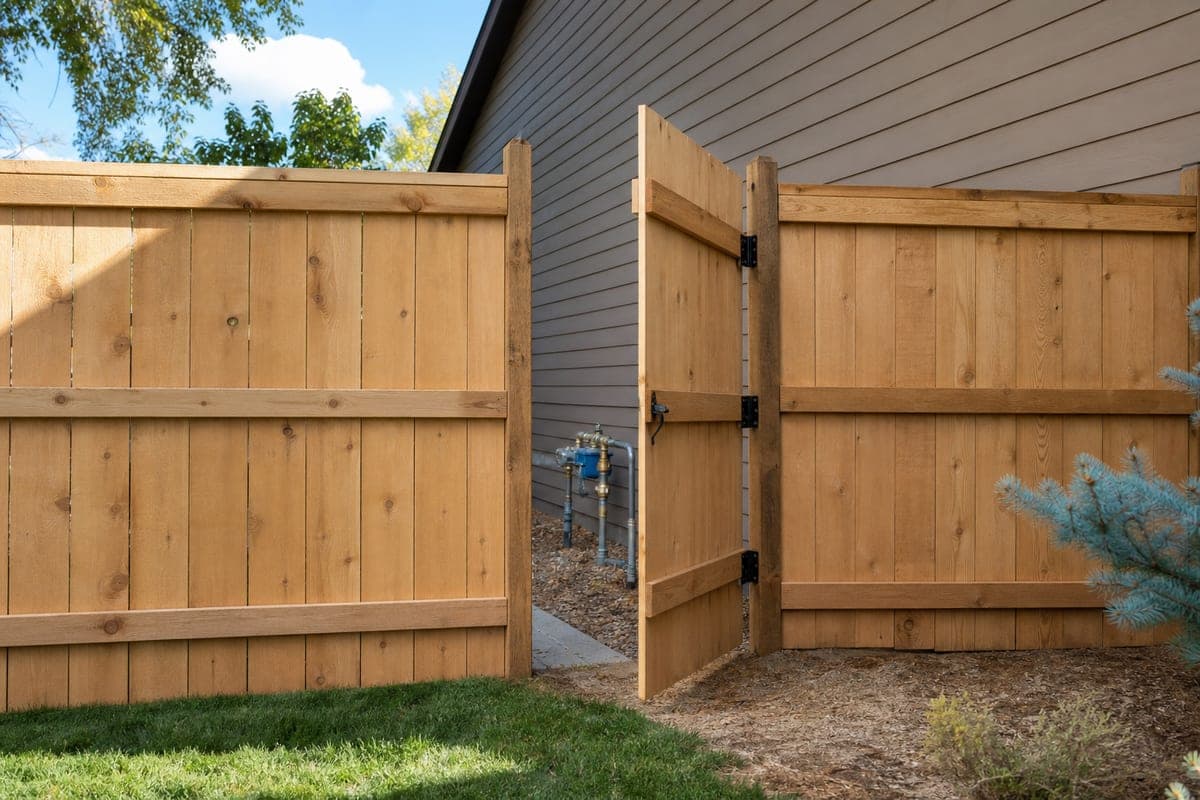 Residential property with gate access for backflow service without the homeowner present